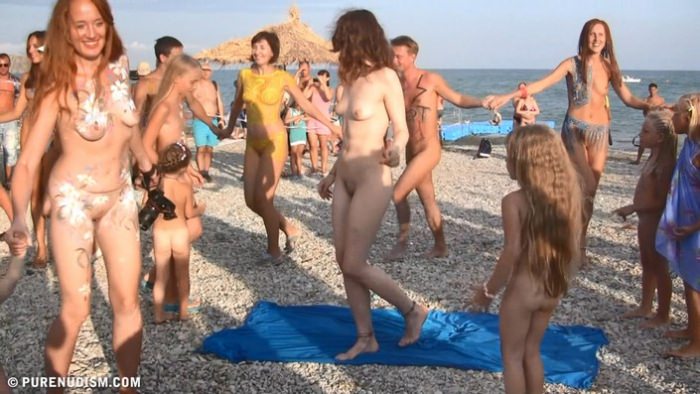 Nudist festive day on the sea beach - Purenudism video